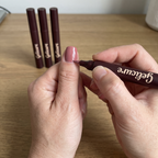 Painting a thumbnail with the Gelicure Nail Pen